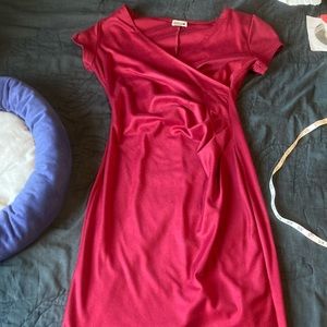 Red knit body con dress with side pleats and wrap bodice